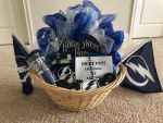 2 Tickets to the Lightning Vs Coyotes game on 3/18/19<br />Homemade door wreath<br />Tervis<br />Frisbee (2)<br />Koozies (2)<br />Flag<br />Promotional Items